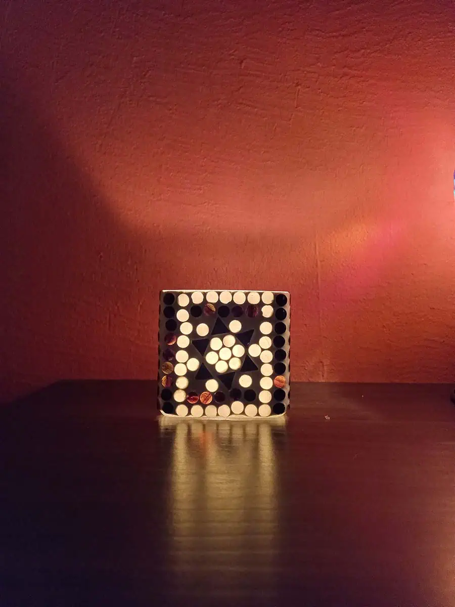 Portavela de vidrio con estrellas