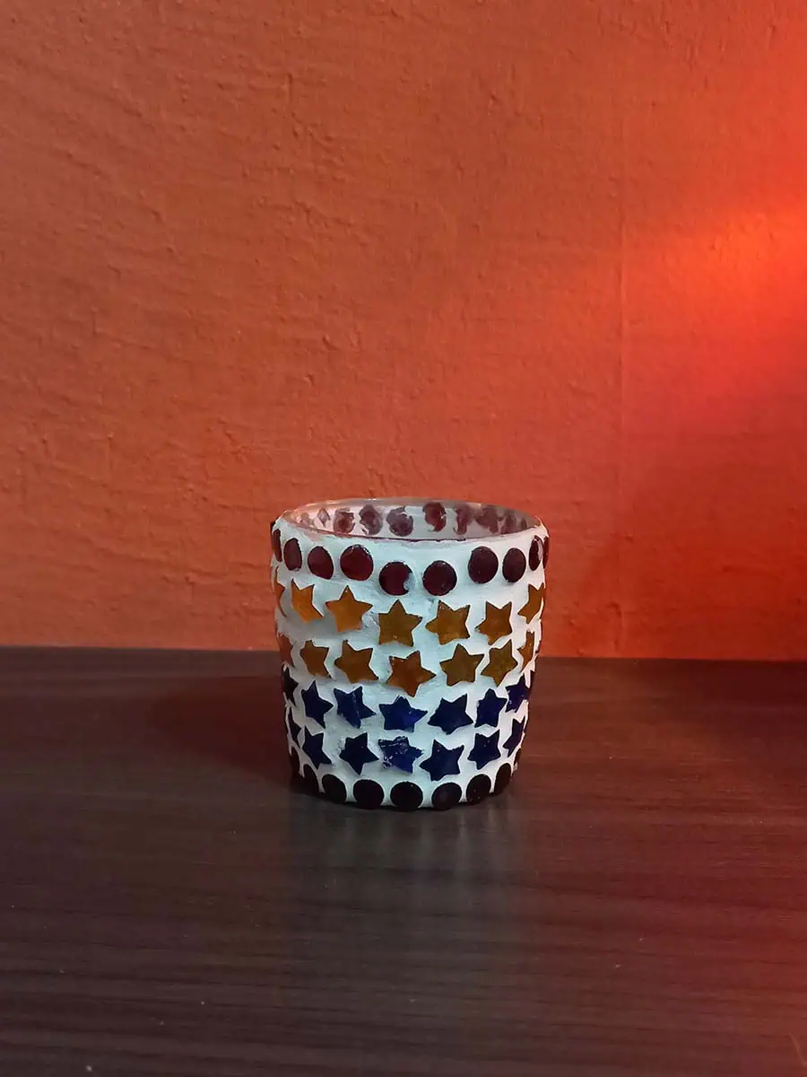 Portavela de vidrio con estrellas