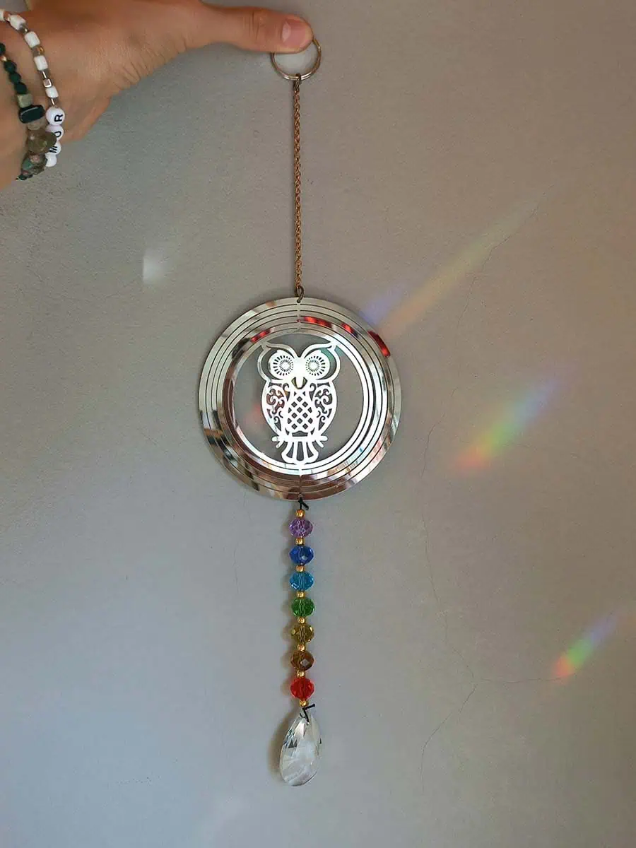 imagen de un atrapasol de acero inoxidable con lechuza