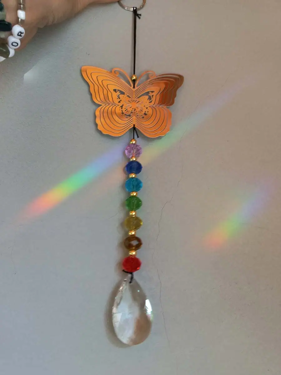 imagen de un atrapasol de acero inoxidable con mariposa