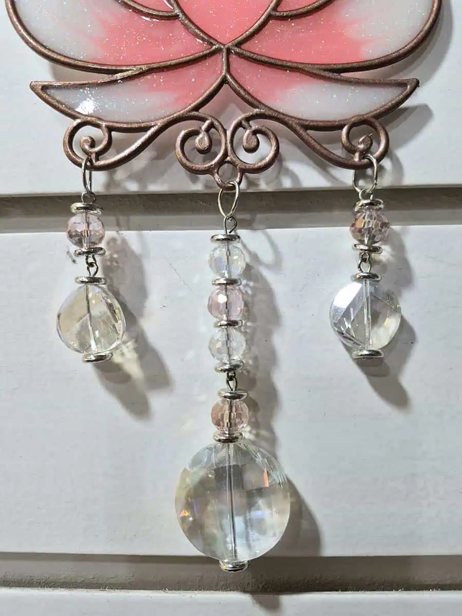 Atrapasol decorativo con flor de loto rosa para ventana