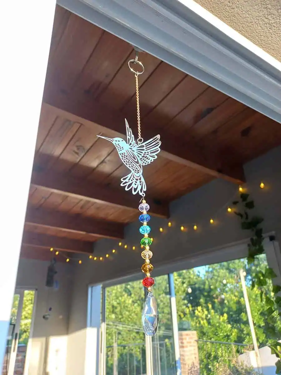 Atrapasol de acero inoxidable con figura de colibrí y cristal para reflejar la luz del sol
