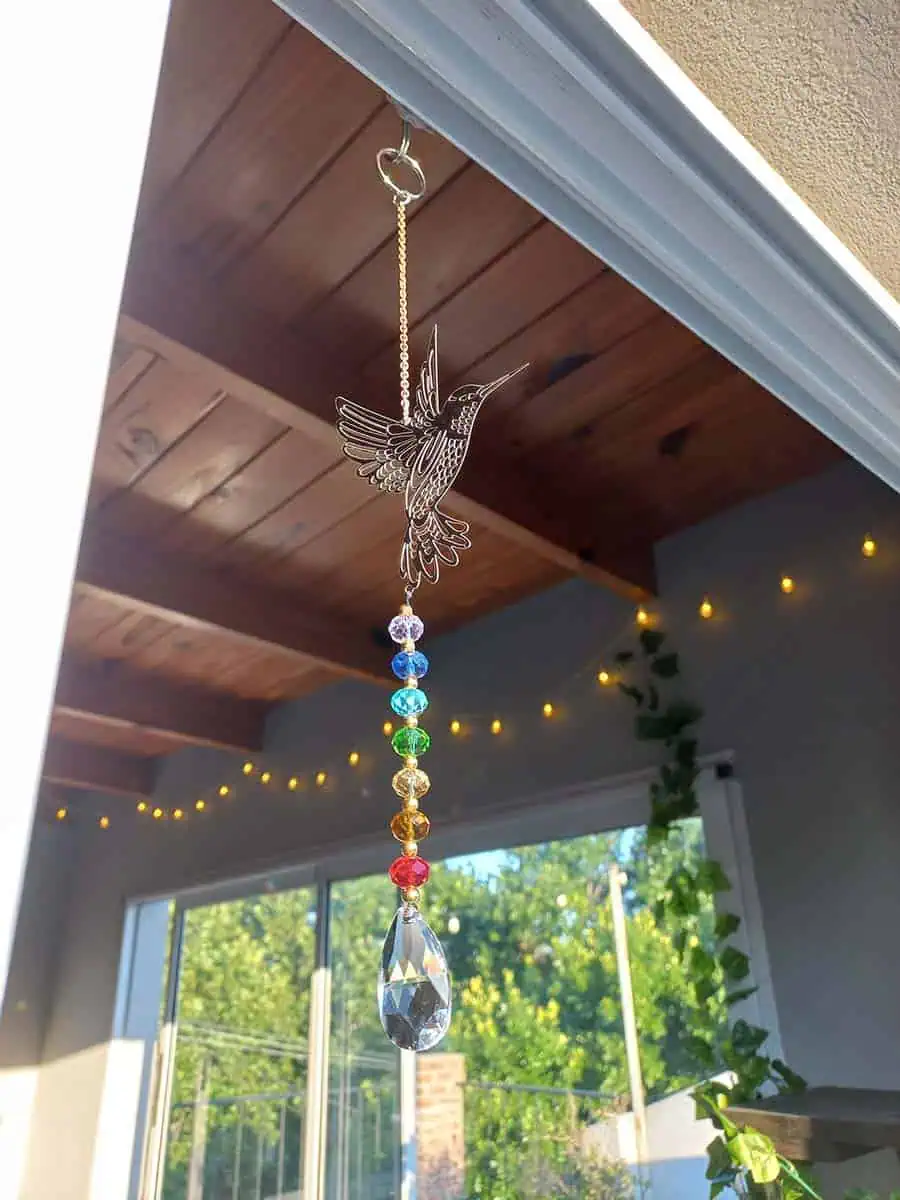 Atrapasol de acero inoxidable con figura de colibrí y cristal para reflejar la luz del sol