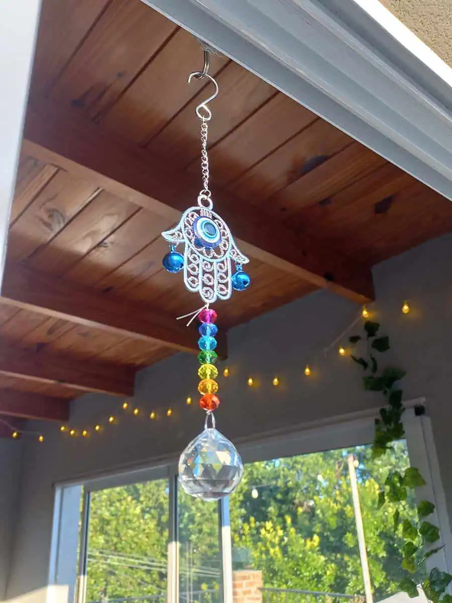 Atrapasol mano de Fátima con ojo turco y cristal decorativo