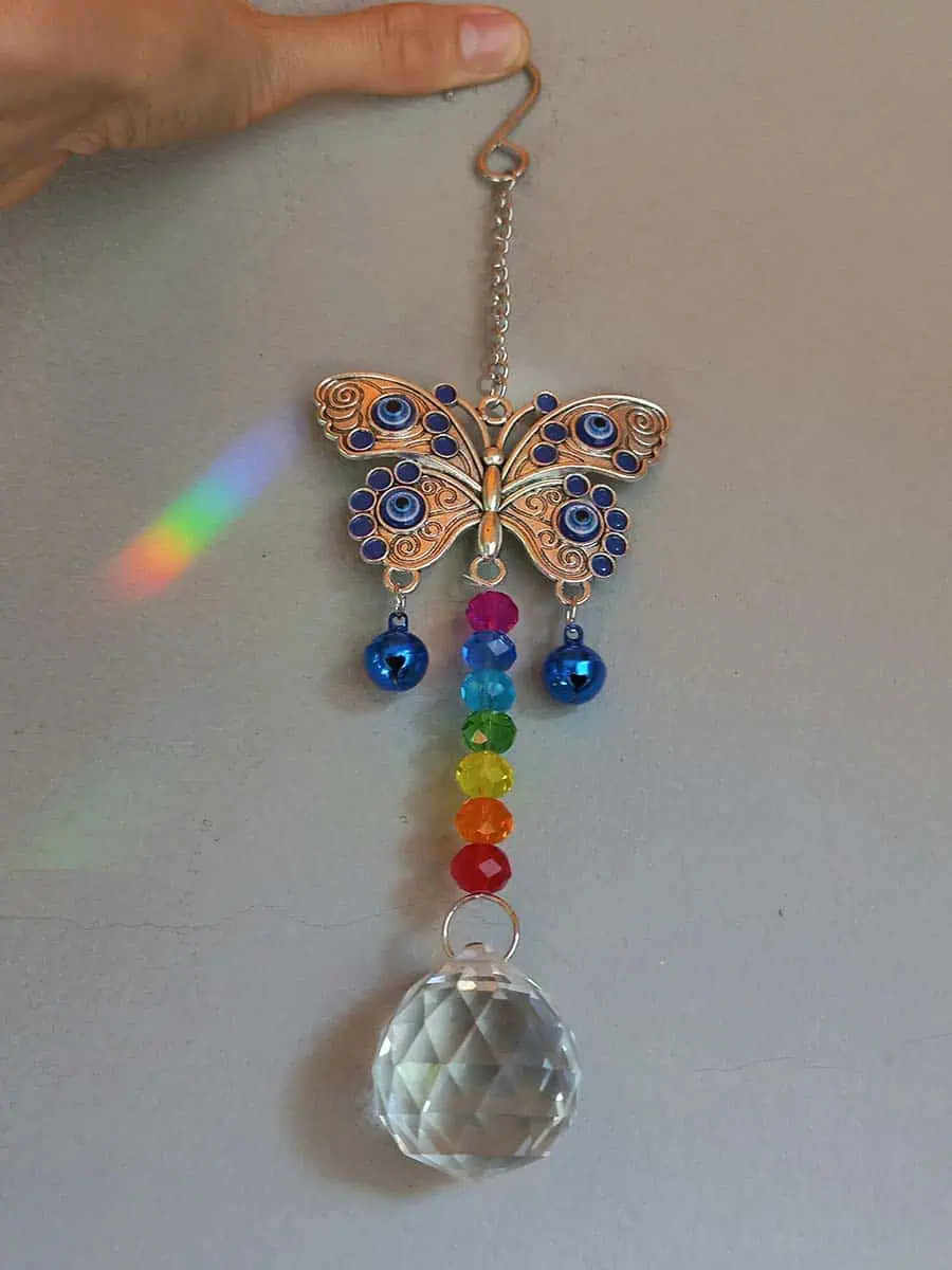 Atrapasol mariposa con ojo turco y cristal decorativo para ventana