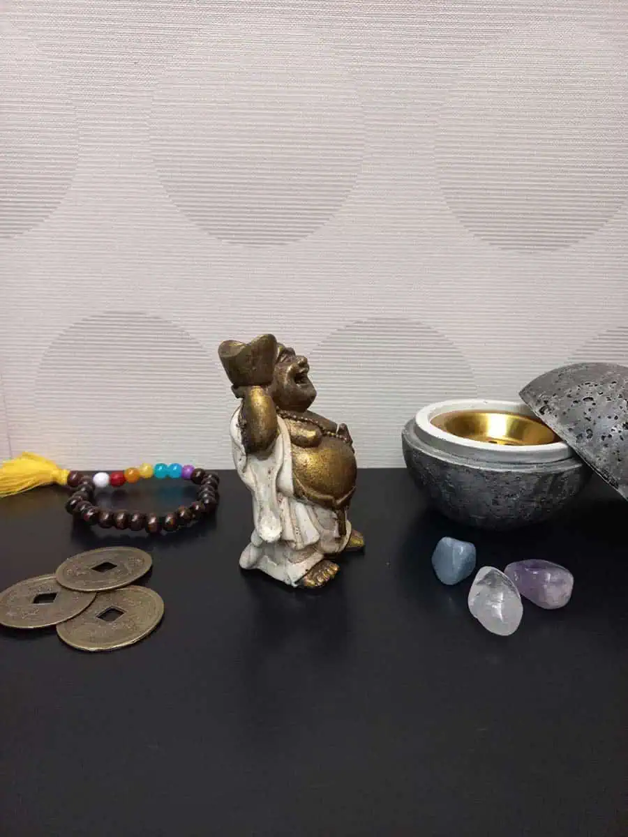 imagen de un Budai de la abundancia con lingote