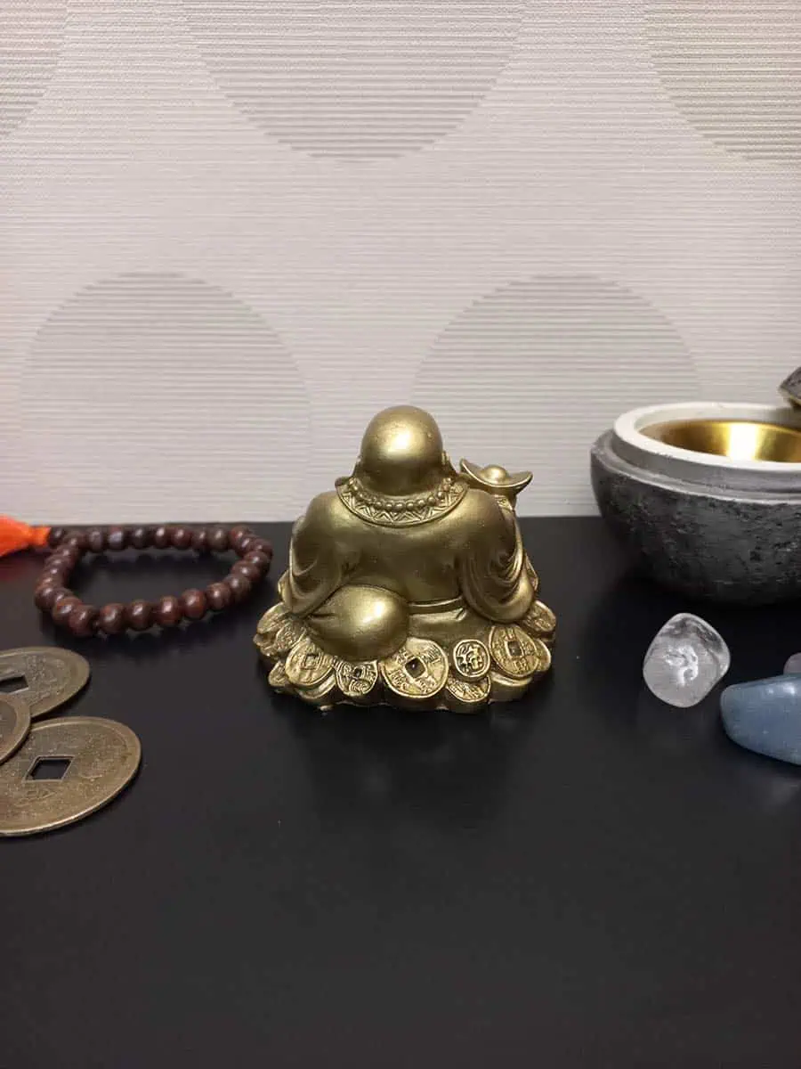 imagen de un Budai de la abundancia con lingote