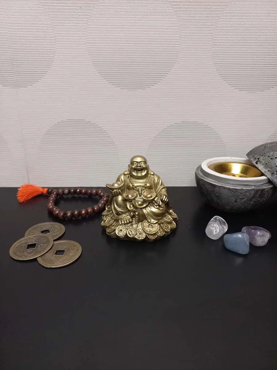 imagen de un Budai de la abundancia con lingote