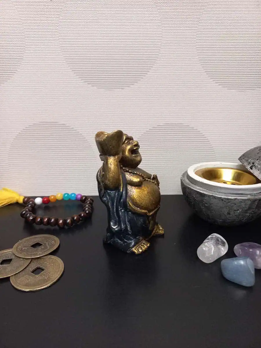 imagen de un Budai de la abundancia con lingote